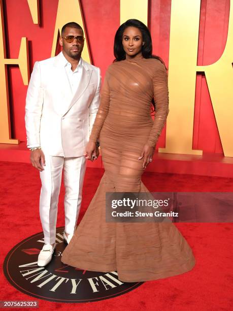 Russell Wilson, Ciara arrives at the 2024 Vanity Fair Oscar Party Hosted By Radhika Jones at Wallis Annenberg Center for the Performing Arts on March...