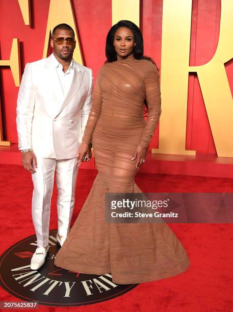 Russell Wilson, Ciara arrives at the 2024 Vanity Fair Oscar Party Hosted By Radhika Jones at Wallis Annenberg Center for the Performing Arts on March...