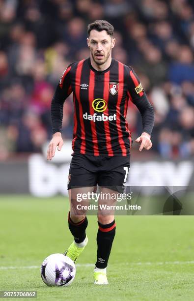 Adam Smith of Bournemouth controls the ball during the Premier League match between AFC Bournemouth and Sheffield United at Vitality Stadium on March...