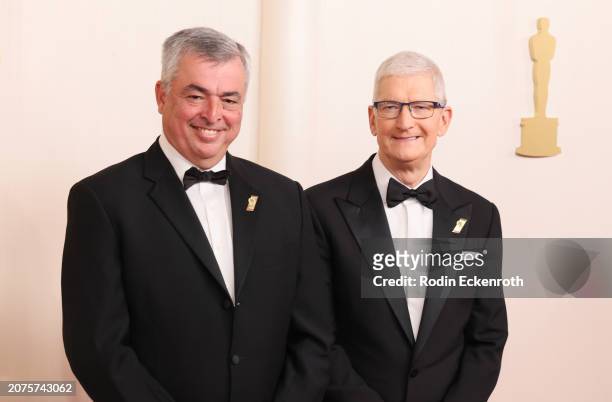Eddy Cue and Tim Cook attend the 96th Annual Academy Awards on March 10, 2024 in Hollywood, California.