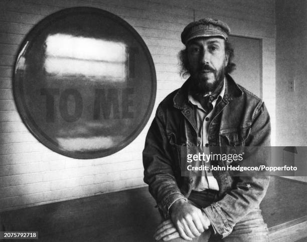English painter and collage artist Richard Hamilton , one of Britain's first pop artists, posed in England in 1972. Hamilton is wearing a denim...
