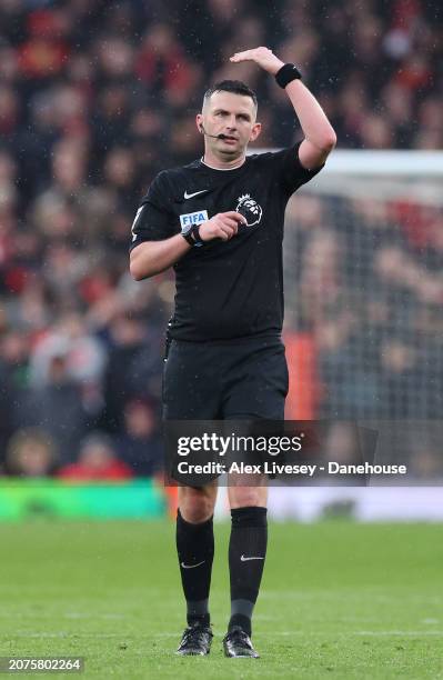 Referee Michael Oliver during the Premier League match between Liverpool FC and Manchester City at Anfield on March 10, 2024 in Liverpool, England.