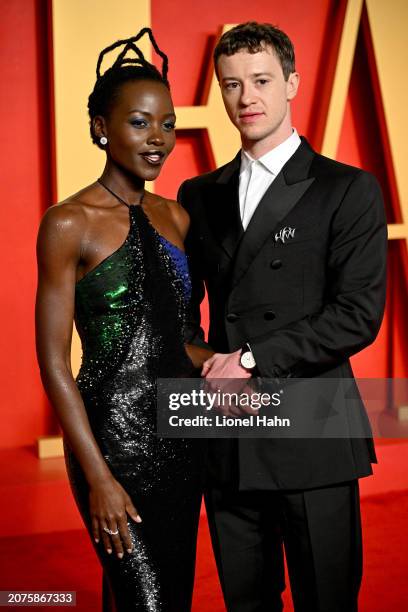 Lupita Nyong'o and Joseph Quinn attend the 2024 Vanity Fair Oscar Party Hosted By Radhika Jones at Wallis Annenberg Center for the Performing Arts on...