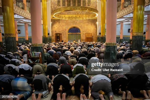 Indonesian muslims perform Tarawih prayers to mark the start of the holy month of Ramadan at UGM Campus Mosque on March 11, 2024 in Yogyakarta,...