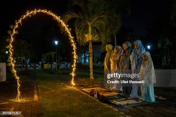 Indonesian muslims perform Tarawih prayers to mark the start of the holy month of Ramadan at UGM Campus Mosque on March 11, 2024 in Yogyakarta,...