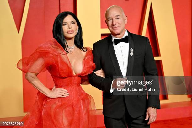 Lauren Sanchez, Jeff Bezos attend the 2024 Vanity Fair Oscar Party Hosted By Radhika Jones at Wallis Annenberg Center for the Performing Arts on...