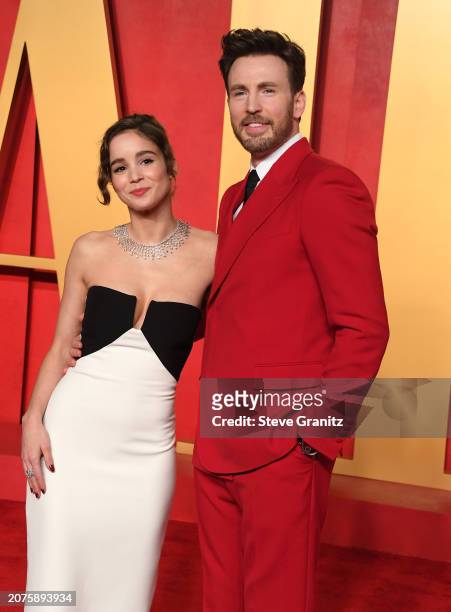 Alba Baptista, Chris Evans arrives at the 2024 Vanity Fair Oscar Party Hosted By Radhika Jones at Wallis Annenberg Center for the Performing Arts on...