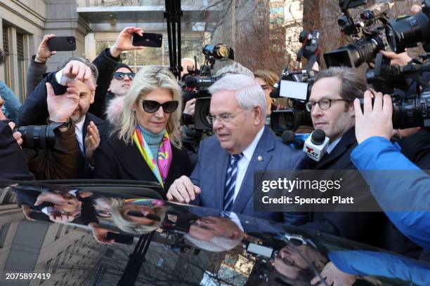 Senator Bob Menendez and his wife Nadine Menendez depart a Manhattan court following an arraignment on new charges in the federal bribery case...