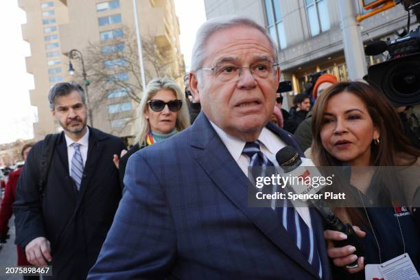Senator Bob Menendez and his wife Nadine Menendez depart a Manhattan court following an arraignment on new charges in the federal bribery case...