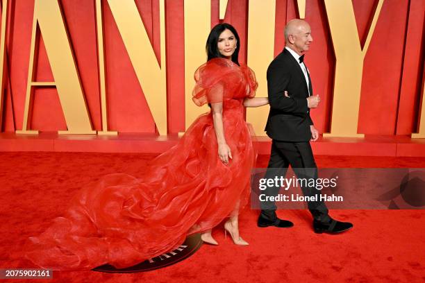 Lauren Sanchez, Jeff Bezos attend the 2024 Vanity Fair Oscar Party Hosted By Radhika Jones at Wallis Annenberg Center for the Performing Arts on...