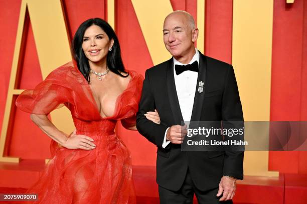 Lauren Sanchez, Jeff Bezos attend the 2024 Vanity Fair Oscar Party Hosted By Radhika Jones at Wallis Annenberg Center for the Performing Arts on...