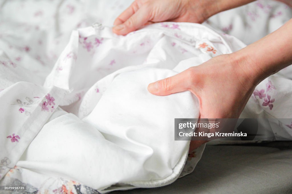 Changing bedsheets