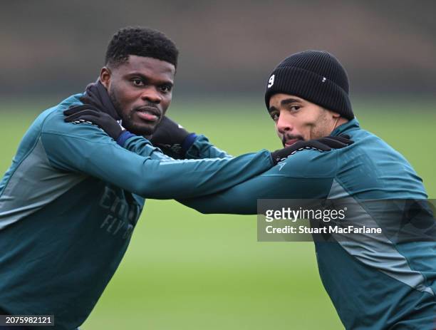 Thomas Partey and Gabriel Jesus of Arsenal during a training session at Sobha Realty Training Centre on March 11, 2024 in London Colney, England.
