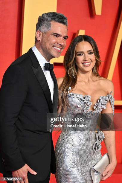 Jessica Alba, Cash Warren attend the 2024 Vanity Fair Oscar Party Hosted By Radhika Jones at Wallis Annenberg Center for the Performing Arts on March...