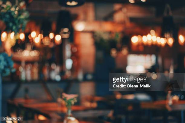 abstract defocused background of restaurant - vintage street light stock pictures, royalty-free photos & images