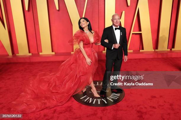 Lauren Sánchez and Jeff Bezos attends the 2024 Vanity Fair Oscar Party Hosted By Radhika Jones at Wallis Annenberg Center for the Performing Arts on...
