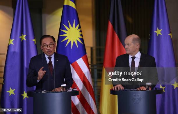 German Chancellor Olaf Scholz and Malaysian Prime Minister Anwar Ibrahim speak to the media during talks at the Chancellery on March 11, 2024 in...