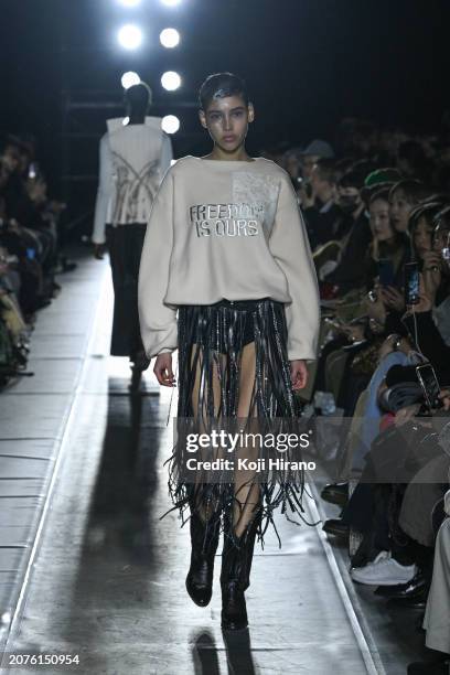 Model walks the runway in a design by TANAKA during the Rakuten Fashion Week TOKYO 2024 A/W on March 11, 2024 in Tokyo, Japan.