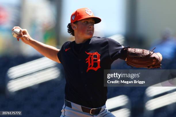 Reese Olson of the Detroit Tigers pitches against the Houston Astros during the first inning in a spring training game at CACTI Park of the Palm...