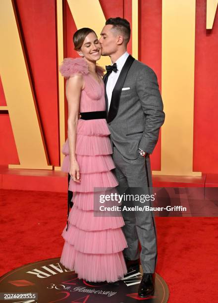 Allison Williams and Alexander Dreymon attend the 2024 Vanity Fair Oscar Party hosted by Radhika Jones at Wallis Annenberg Center for the Performing...