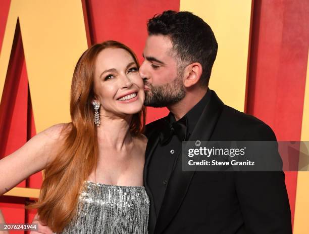 Lindsay Lohan, Bader Shammas arrives at the 2024 Vanity Fair Oscar Party Hosted By Radhika Jones at Wallis Annenberg Center for the Performing Arts...