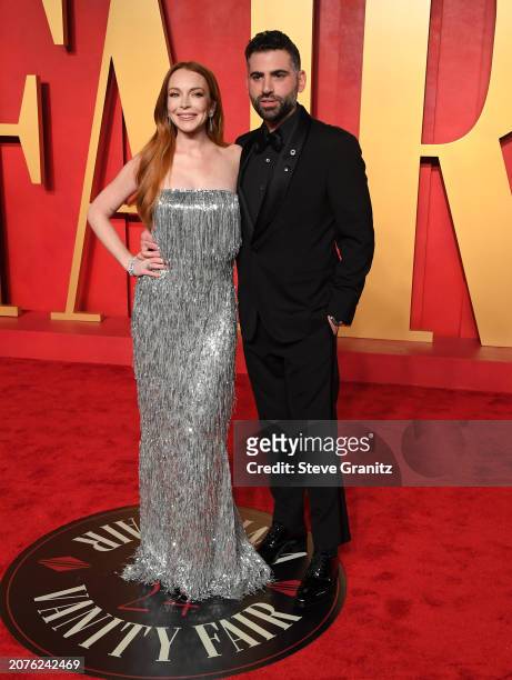 Lindsay Lohan, Bader Shammas arrives at the 2024 Vanity Fair Oscar Party Hosted By Radhika Jones at Wallis Annenberg Center for the Performing Arts...