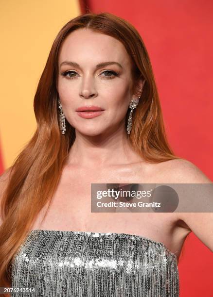 Lindsay Lohan arrives at the 2024 Vanity Fair Oscar Party Hosted By Radhika Jones at Wallis Annenberg Center for the Performing Arts on March 10,...