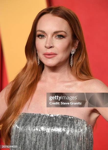 Lindsay Lohan arrives at the 2024 Vanity Fair Oscar Party Hosted By Radhika Jones at Wallis Annenberg Center for the Performing Arts on March 10,...