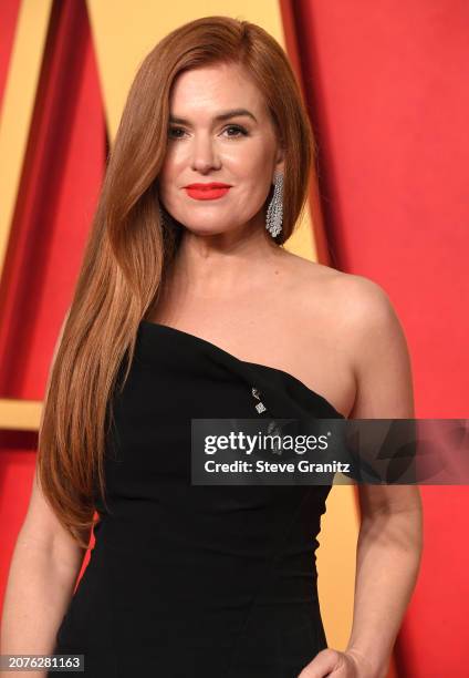 Isla Fisher arrives at the 2024 Vanity Fair Oscar Party Hosted By Radhika Jones at Wallis Annenberg Center for the Performing Arts on March 10, 2024...