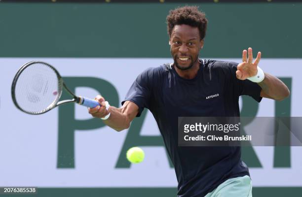 Gael Monfils of France plays a forehand against Cameron Norrie of Great Britain in their third round match during the BNP Paribas Open at Indian...