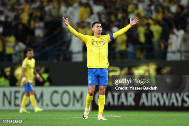 Cristiano Ronaldo of Al Nassr celebrates his team's second goal, an own goal scored by Khalid Eisa of Al Ain during the AFC Champions League Quarter...