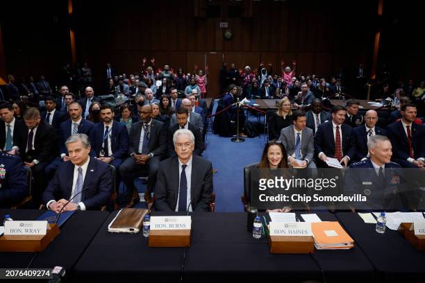 Federal Bureau of Investigation Director Christopher Wray, Central Intelligence Agency Director William Burns, Director of National Intelligence...