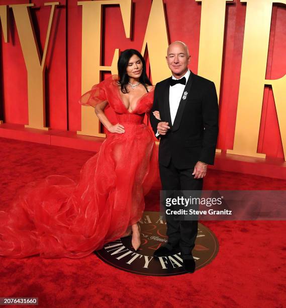 Lauren Sánchez, Jeff Bezos arrives at the 2024 Vanity Fair Oscar Party Hosted By Radhika Jones at Wallis Annenberg Center for the Performing Arts on...