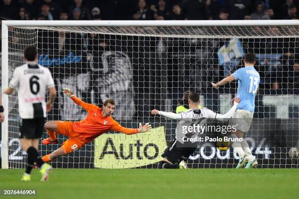 Ivan Provedel of SS Lazio fails to save as Lorenzo Lucca of Udinese Calcio scores his team's first goal during the Serie A TIM match between SS Lazio...