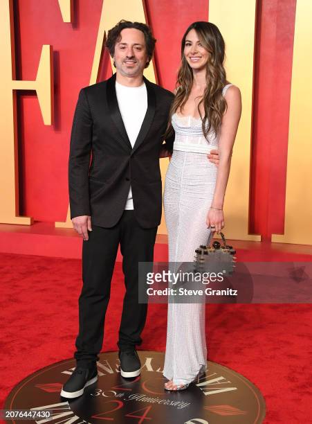 Sergey Brin and Gerelyn Gilbert Soto arrive at the 2024 Vanity Fair Oscar Party Hosted By Radhika Jones at Wallis Annenberg Center for the Performing...