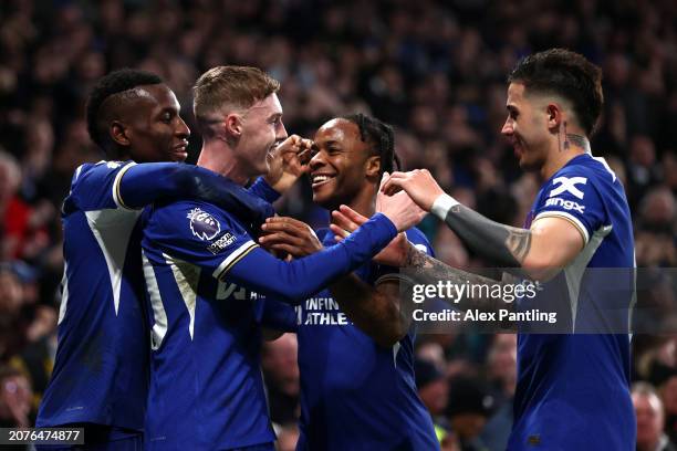 Cole Palmer of Chelsea celebrates scoring his team's second goal with teammates during the Premier League match between Chelsea FC and Newcastle...