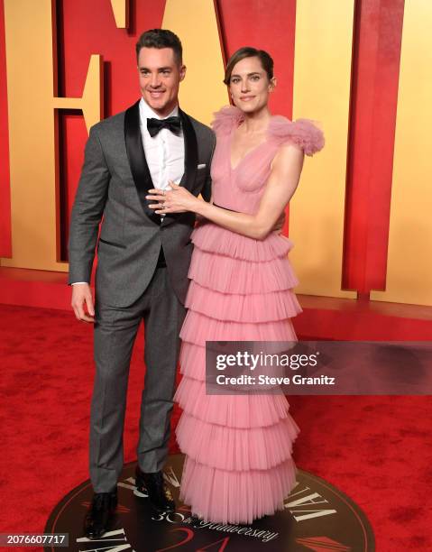 Allison Williams and Alexander Dreymon arrives at the 2024 Vanity Fair Oscar Party Hosted By Radhika Jones at Wallis Annenberg Center for the...