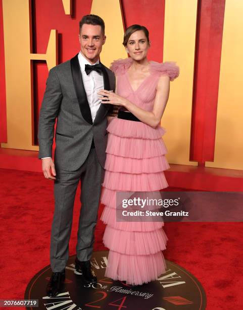 Allison Williams and Alexander Dreymon arrives at the 2024 Vanity Fair Oscar Party Hosted By Radhika Jones at Wallis Annenberg Center for the...