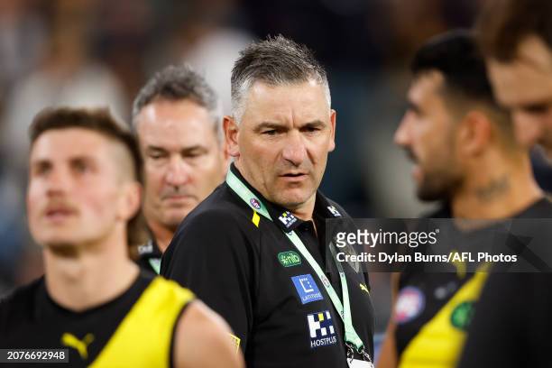 Adem Yze, Senior Coach of the Tigers addresses his players during the 2024 AFL Round 01 match between the Carlton Blues and the Richmond Tigers at...
