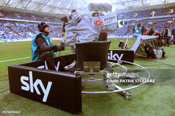 Cameraman of German pay tv channel Sky films during the German first division Bundesliga football match FC Schalke 04 vs 1. FC Nuremberg in the...