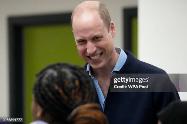 Prince William, Prince Of Wales smiles as he speaks to a young person during his visit to WEST, a new OnSide Youth Zone WEST on March 14, 2024 in...