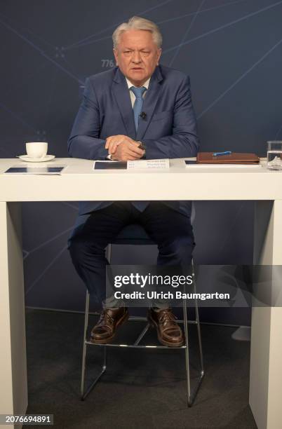 Armin Papperger, CEO of German weapons producer and automotive supplier Rheinmetall AG, addresses a virtual press conference to present annual...