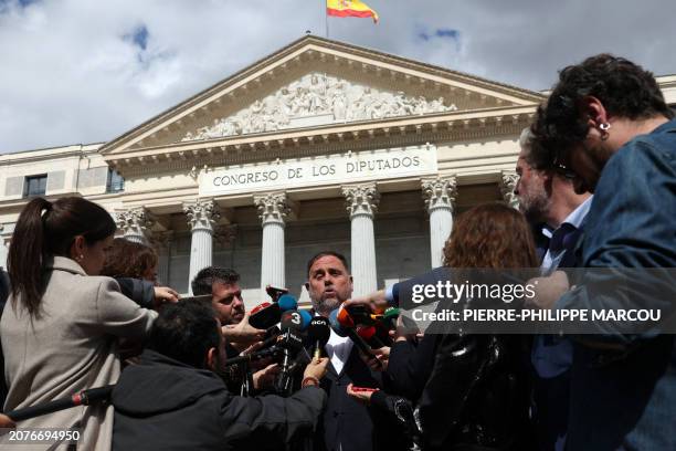 President of Catalan separatist party Esquerra Republicana de Catalunya Oriol Junqueras speaks to members of the media after a plenary session at the...