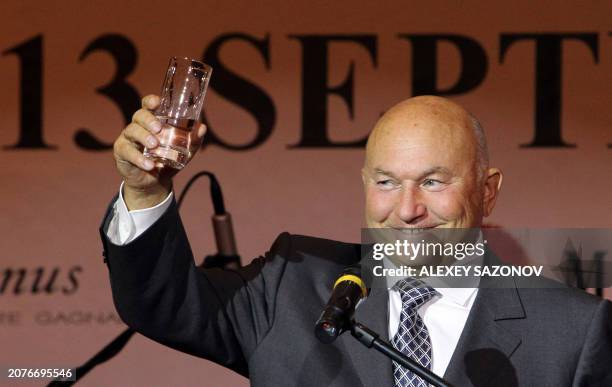 Moscow's Mayor Yuri Luzhkov toasts during the opening ceremony of the Lotte Hotel in Moscow on September 13, 2010. The embattled Moscow mayor and his...
