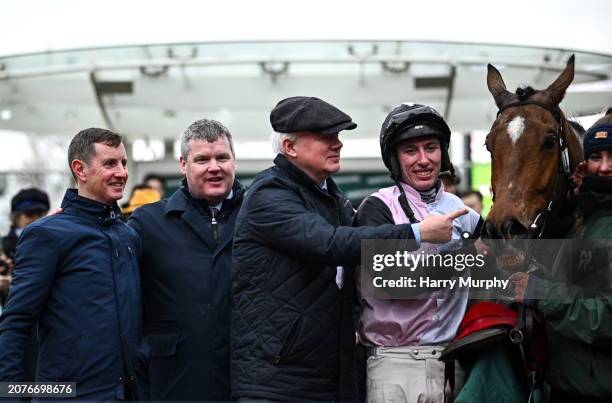 Gloucestershire , United Kingdom - 14 March 2024; Trainer Gordon Elliott, second from left, winning connections and jockey Jack Kennedy celebrate...