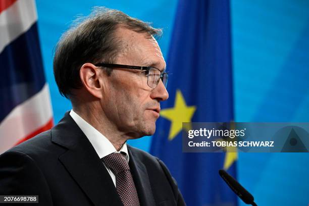 Norwegian Foreign Minister Espen Barth Eide addresses a joint press conference with the German Foreign Minister at the Foreign Office in Berlin on...