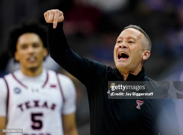 Head coach Grant McCasland of the Texas Tech Red Raiders calls a play during the first half of a quarterfinal game of the Big 12 Men's Basketball...