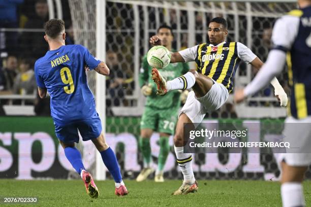 Union's Dennis Eckert Ayensa and Fenerbahce's Alexander Djiku fight for the ball during a soccer game between Turkish club Fenerbahce SK and Belgian...