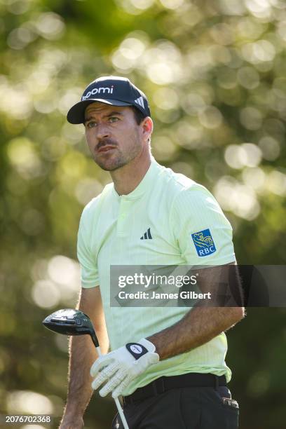 Nick Taylor of Canada watches a shot from the 15th tee during the first round of THE PLAYERS Championship at Stadium Course at TPC Sawgrass on March...