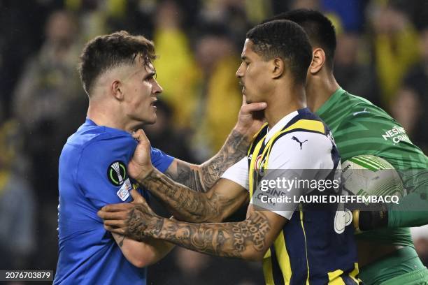 Union's Dennis Eckert Ayensa and Fenerbahce's Jayden Oosterwolde react during a soccer game between Turkish club Fenerbahce SK and Belgian club...